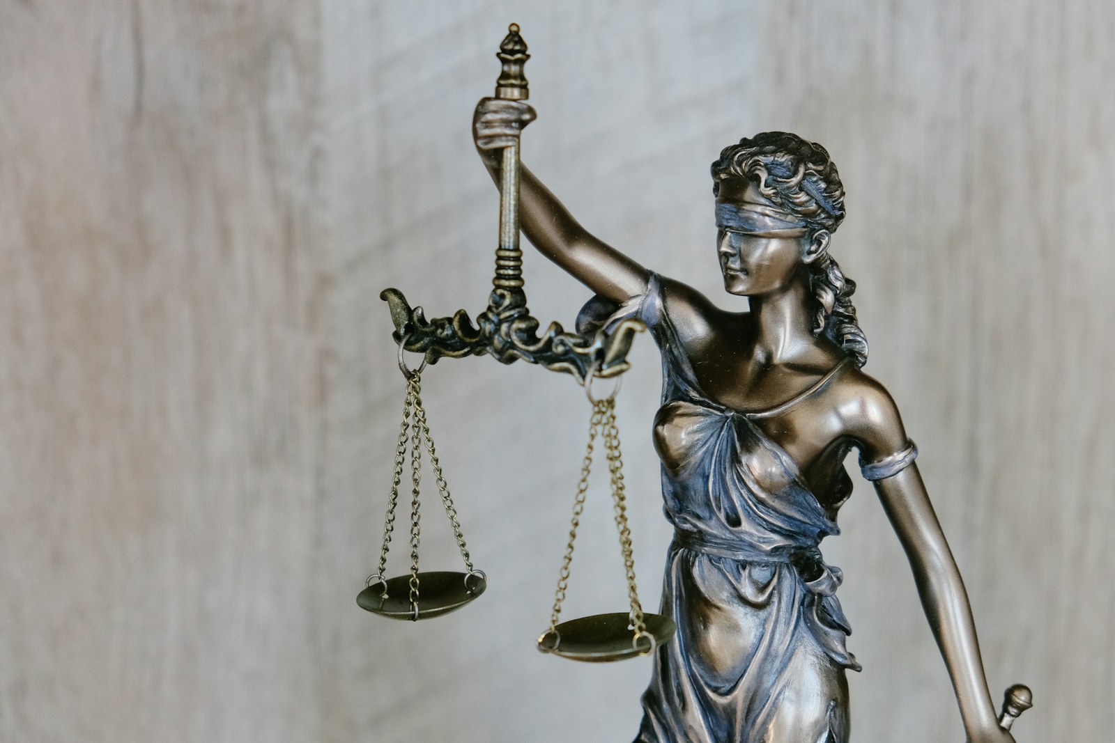 A statue of justice holding scales